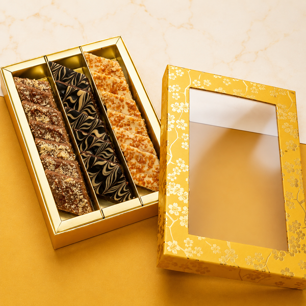 Corporate Gifts-Gift box of hazelnut katli, caramel katlis, and chocolate kaju katlis/ Fusion Sweets