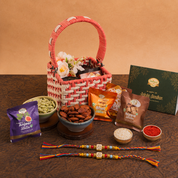 Pink Woven Basket with dryfruit Jars with 2 Rakhis
