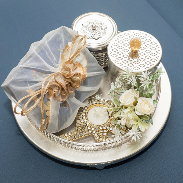 Silver round Tray of Kaju Katli/ Mithai/ Sweet Pouches and Dryfruit