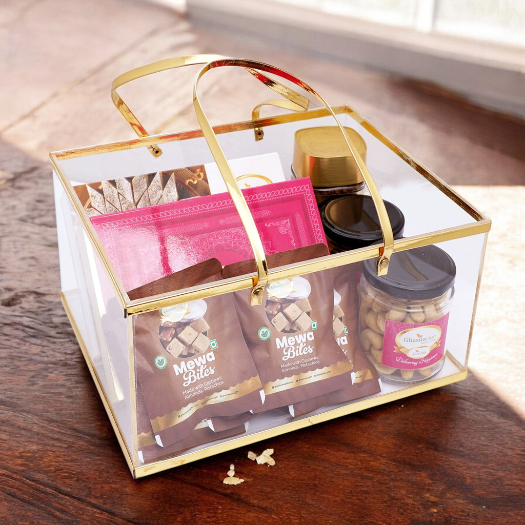 Acrylic Basket of Kaju Katli, Milk cake, 5 mewa bites, 2 jars of Roasted Cashews and Almonds, and Coffee