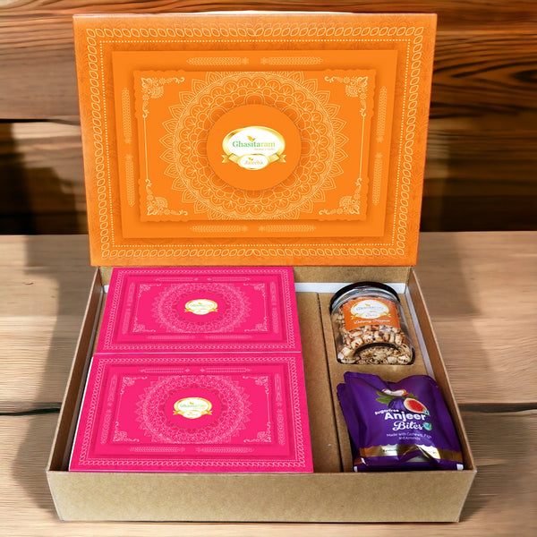 Corporate Gifts-Ghasitaram Orange Hamper Box with Sugarfree Kaju Katli, Sugarfree Peda, Sugarfree Bites and Wheat Puffs