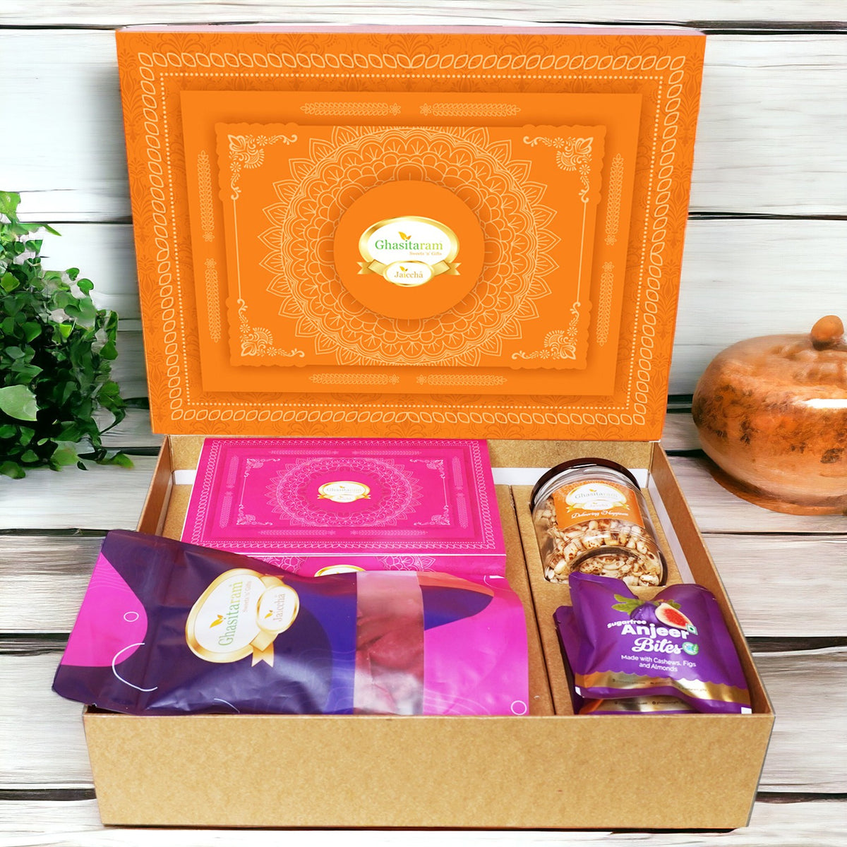 Corporate Gifts-Ghasitaram Orange Hamper Box with Sugarfree Kaju Katli, Beetroot Chips, Wheat Puffs and Sugafree Bites