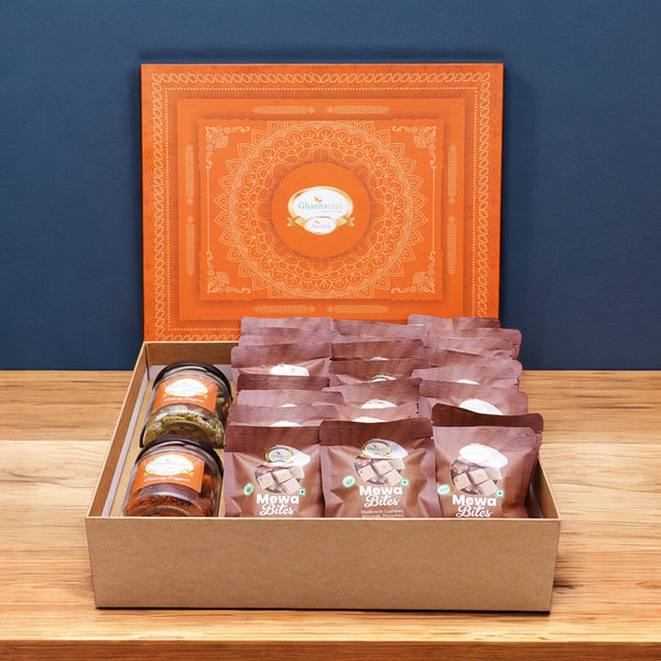 Corporate Gifts-Ghasitaram Orange Hamper Box of  24 pcs mewa bites, Mixed Dryfruit Jar and Paan Raisins Jar