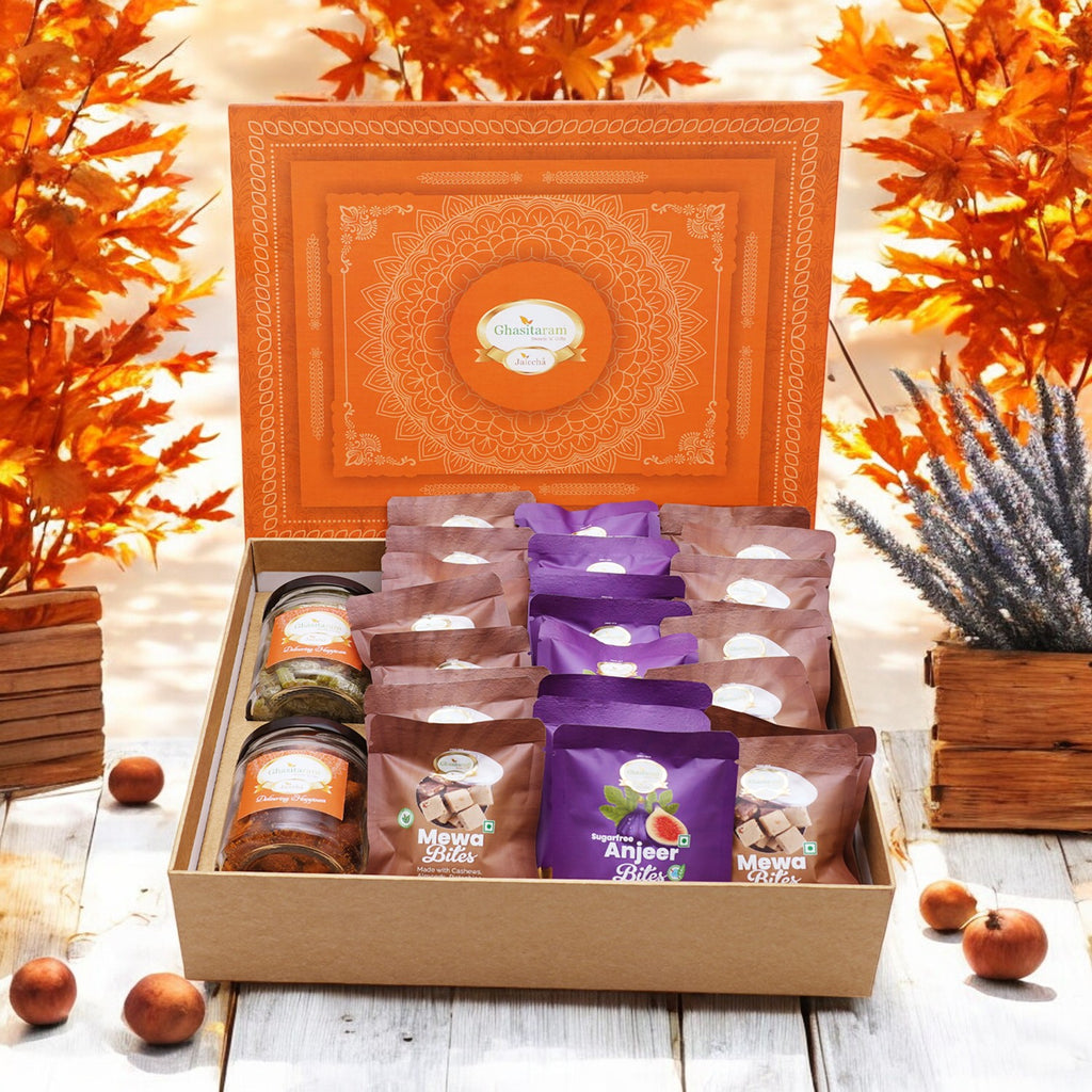 Corporate Gifts-Ghasitaram Orange Hamper Box of  24 pcs mewa and Sugarfree Anjeer Bites, Mixed Dryfruit Jar and Paan Raisins Jar