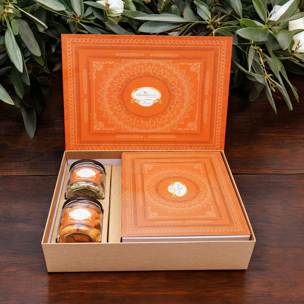 Corporate Gifts-Ghasitaram Orange Hamper Box with exotic sweets,Crunchy Cashew and Paan Raisins Jar