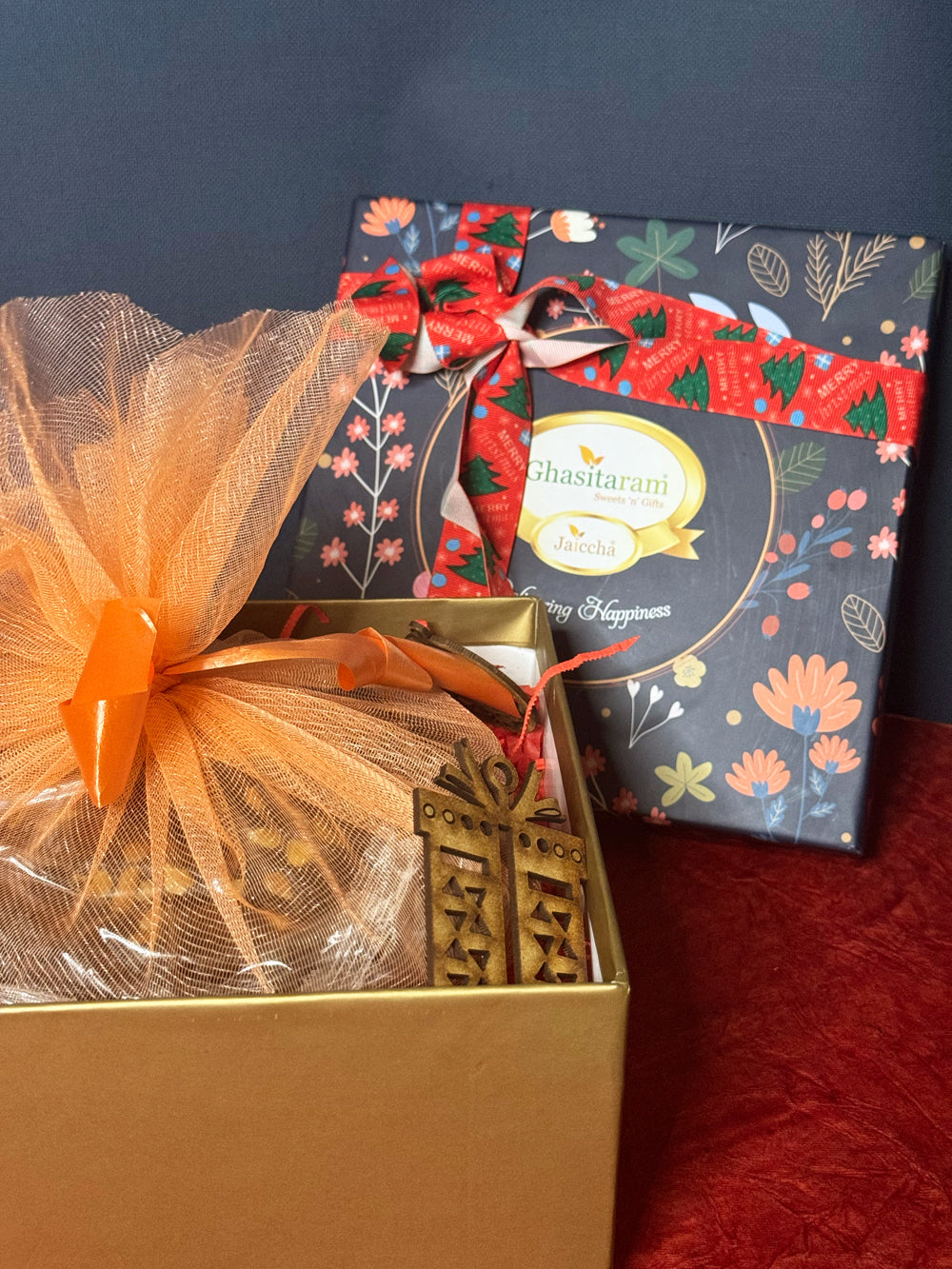 Ghasitaram Christmas Hamper Box with plum cake and chocolates and tags