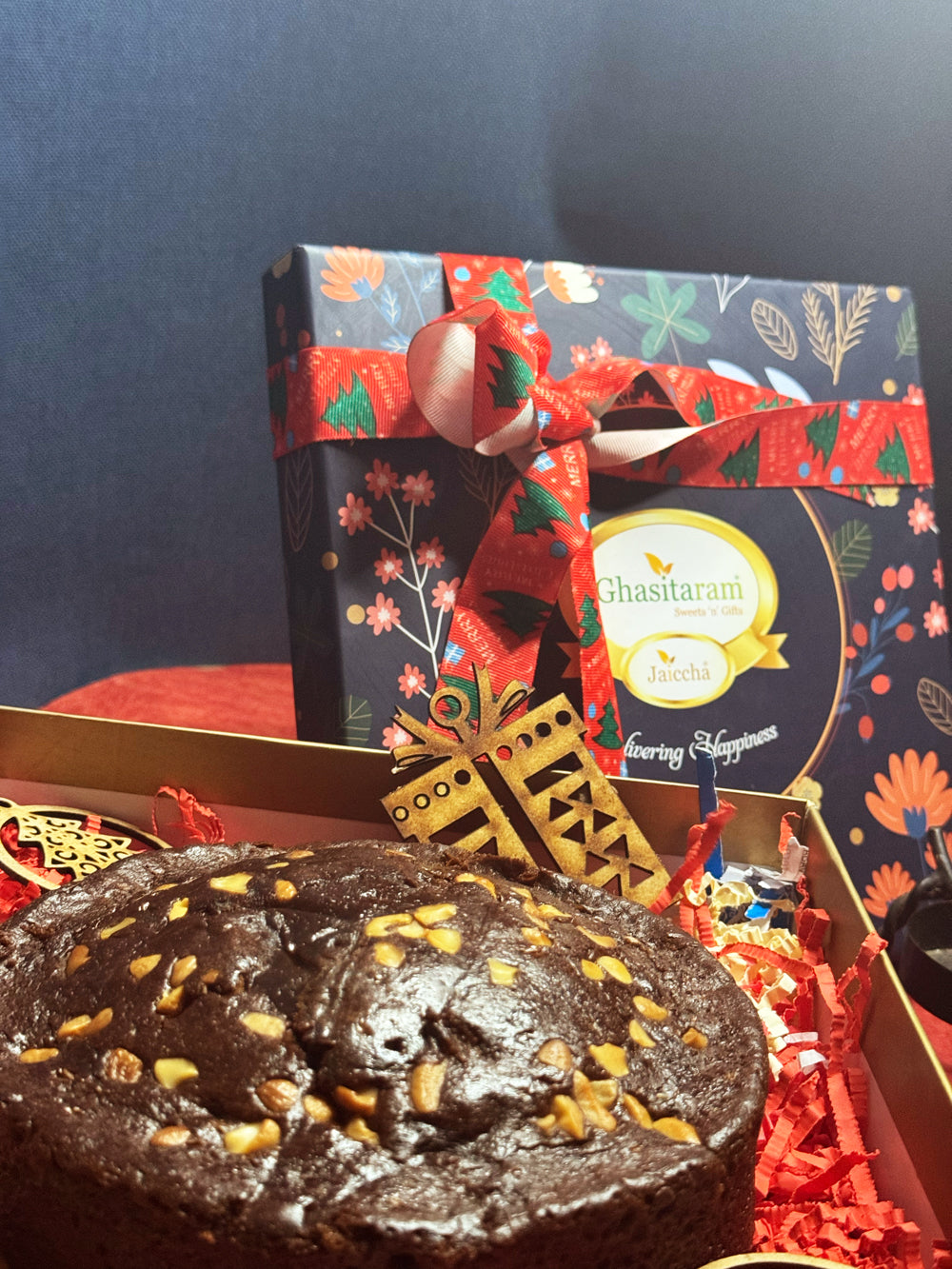 Ghasitaram Christmas Hamper Box with plum cake and chocolates and tags