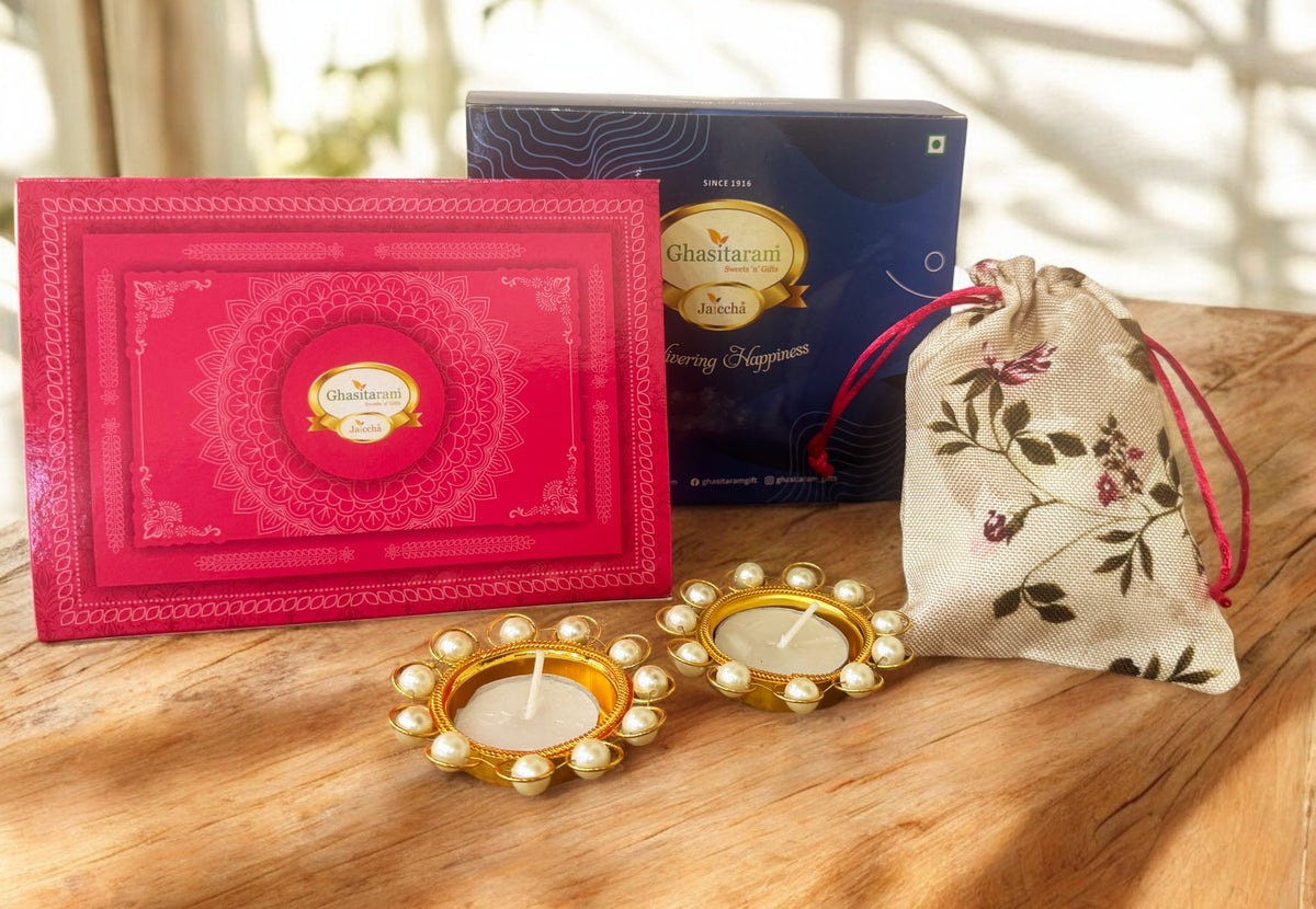 Blue box of Best Bites, Almonds jute pouch and t-lights