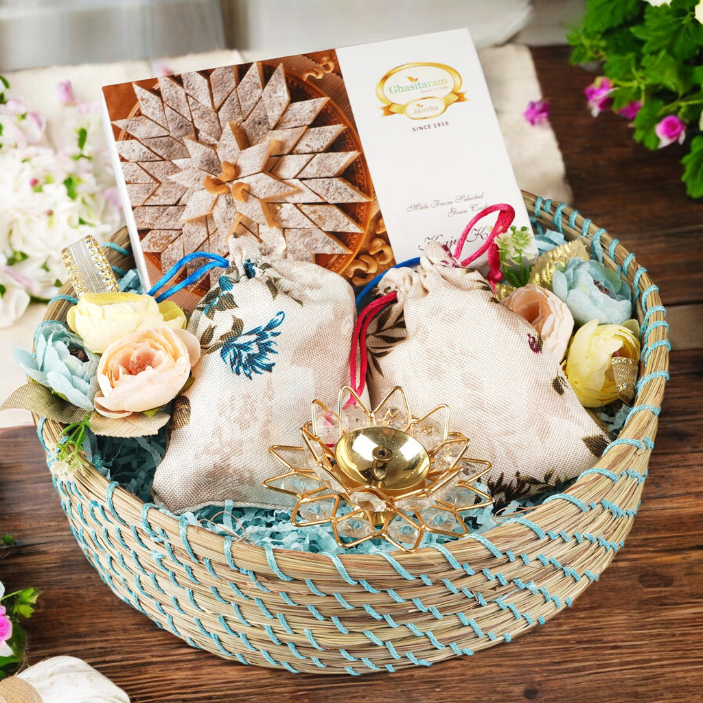 Corporate Gifts-Blue Jute Basket of Kaju katli , 2 Jute pouches of Dryfruits  and a Diya