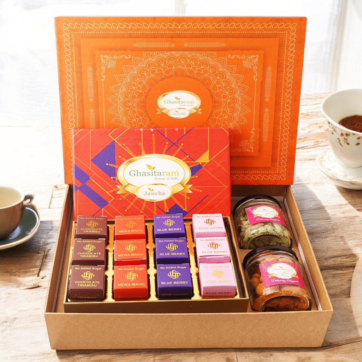 Corporate Gifts-Orange Hamper box with sugarfree bites, crunchy cashew, paan raisins, and diya