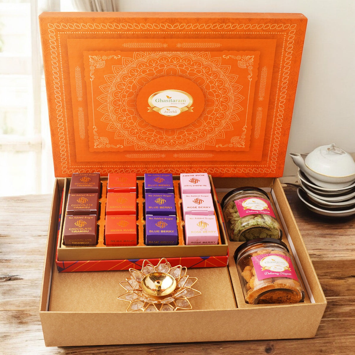 Orange Hamper box with sugarfree bites, crunchy cashew, Flavour raisins, and diya