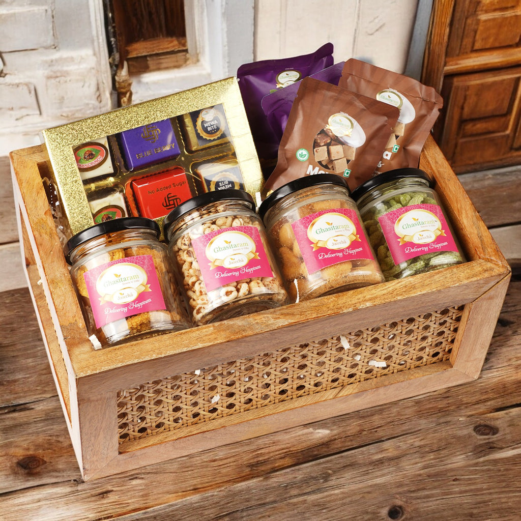 Corporate Gifts-Rectangle Rattan Basket of Best Bites, mewa bites, anjeeer bites, 2 jars of dryfruits and 2 jars Namkeens