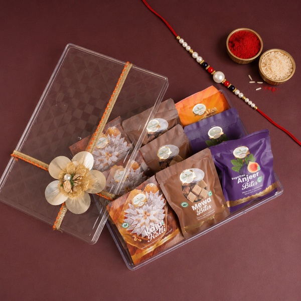 Acrylic Gift Box of Assorted Mithai Pouches (Pack of 9)  with Rakhi