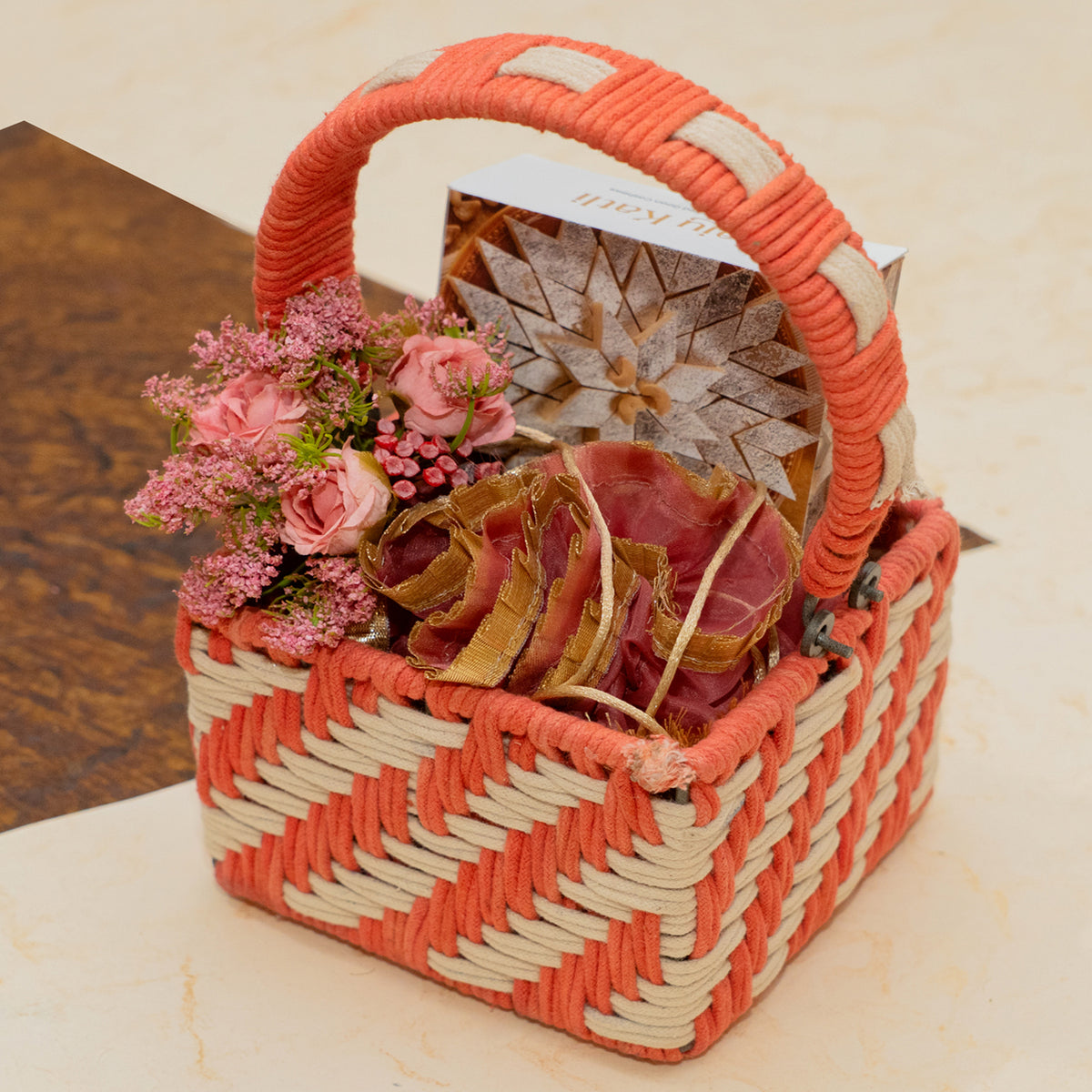 Corporate Gifts-Small Red Rope basket of kaju Katlis and Chocolate Almonds
