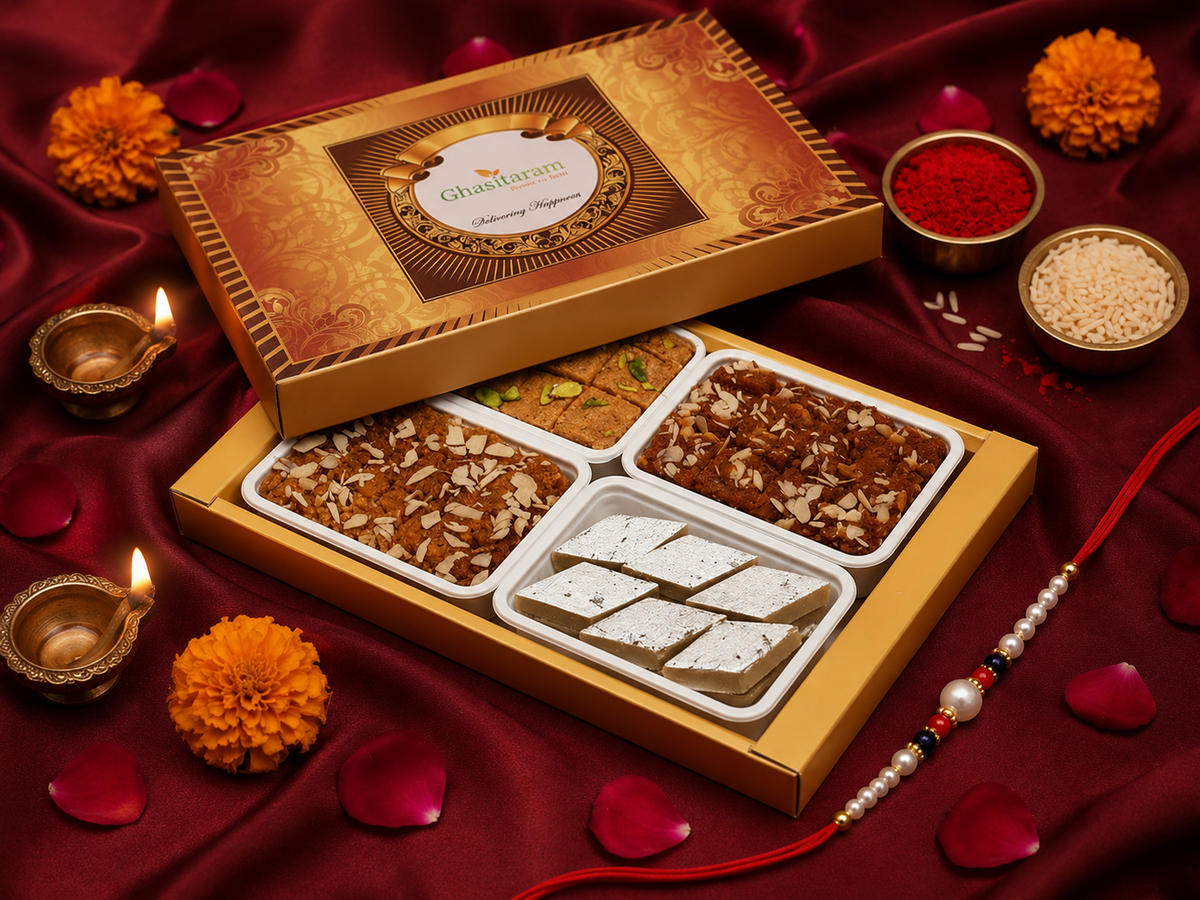 Big Box of Kaju Katli, Mysore Pak, Dodha Barfi and Milk Cake with Pearl Beads Rakhi