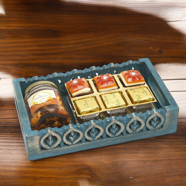 Blue wooden Tray with assorted Bites and Mix Dryfruits Jar