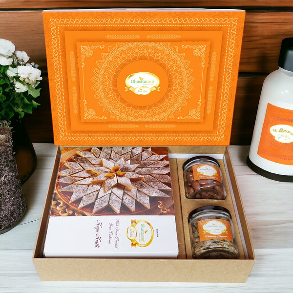 Ghasitaram Orange Hamper Box with Kaju Katli , Choco Almonds, and Paan Raisins