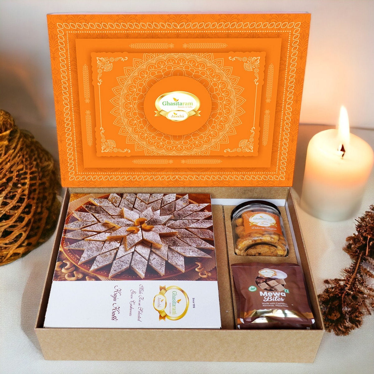 Ghasitaram Orange Hamper Box with Kaju Katli, Mewa Bites and Crunchy Cashews