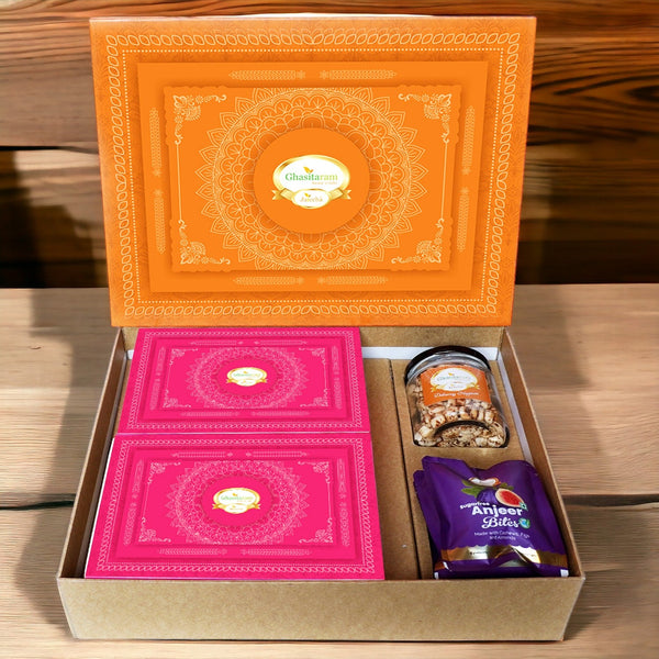 Ghasitaram Orange Hamper Box with Sugarfree Kaju Katli, Sugarfree Peda, Sugarfree Bites and Wheat Puffs