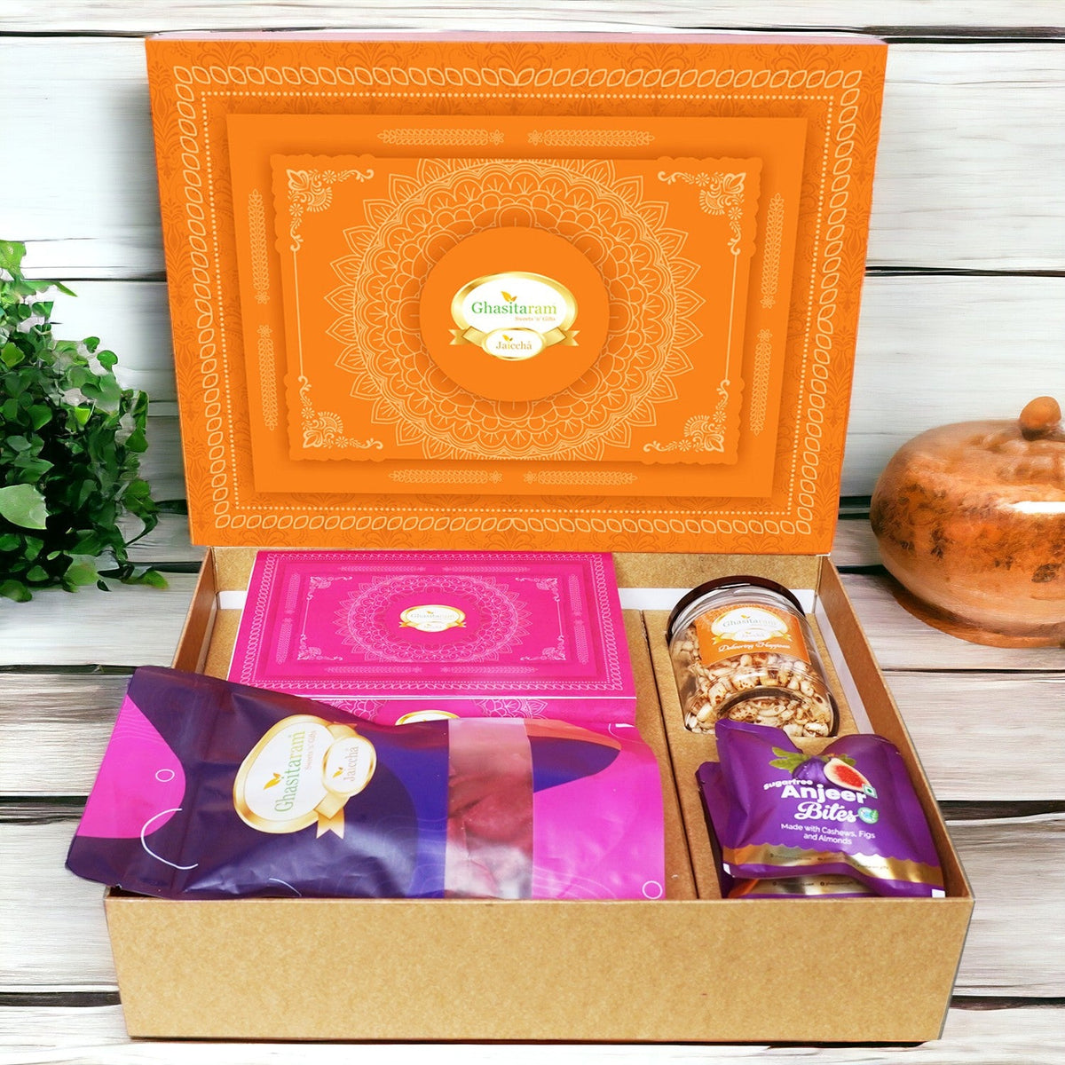 Ghasitaram Orange Hamper Box with Sugarfree Kaju Katli, Beetroot Chips, Wheat Puffs and Sugafree Bites