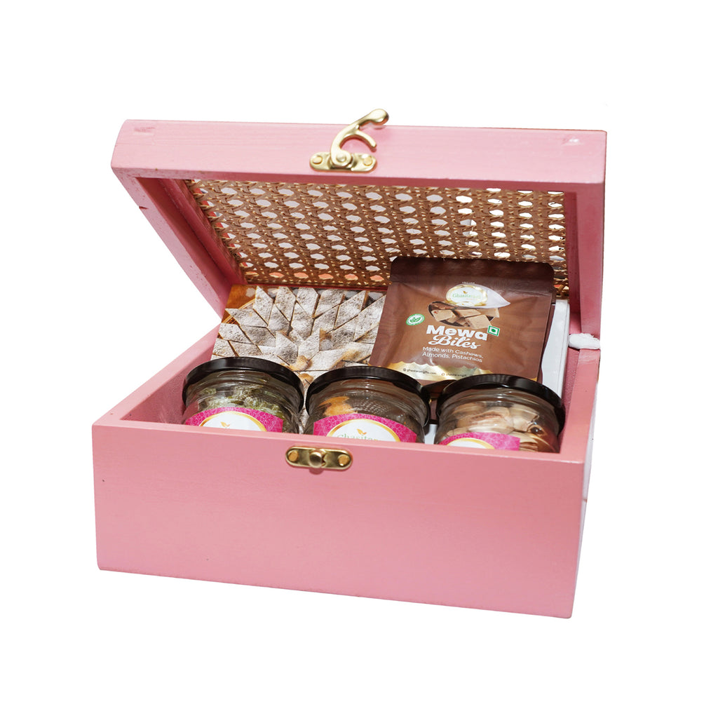 Pink Cane Rattan box with Kaju Katli, Paan Raisins, Crunchy Cashew, Pista and Mewa Bites