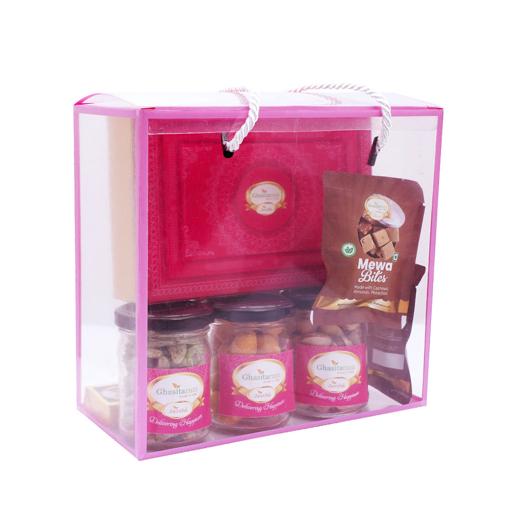 Transparent Gift Box with Kaju Katli, jars of crunchy cashews, paan raisins, pistachios and 5 Mewa Bites