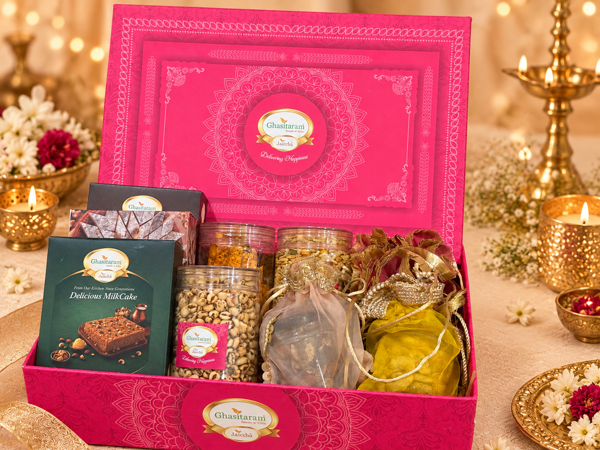 Corporate Gifts-Pink hamper box with Sweets, Namkeen, Bites and Dry fruits.