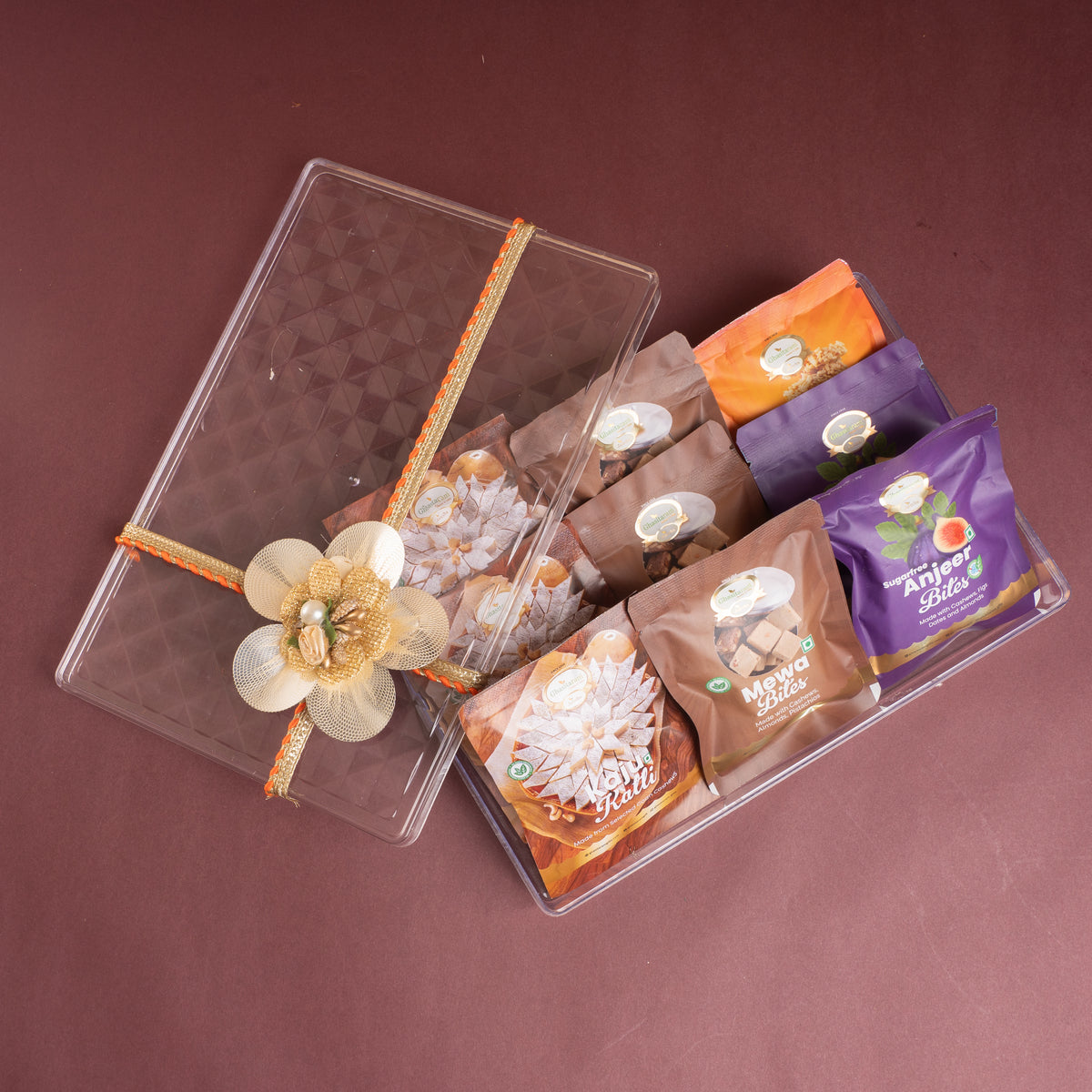 Best indian sweets for diwali-Diwali Gifts-Acrylic Gift box of Assorted Mithai Pouches Pack of 6