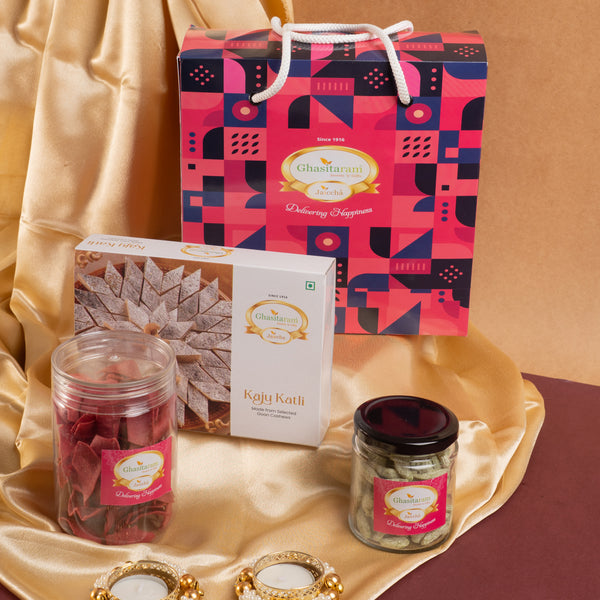 Bag Box of Kaju Katli , namkeen, dryfruit and t- Lights