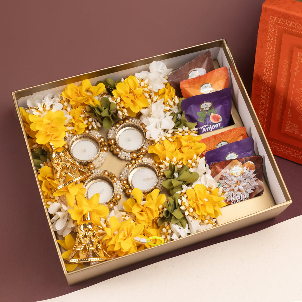 Diwali gift hampers-Diwali Gifts-Orange Hamper box with toran,t lights and assorted mithai/sweets pouches