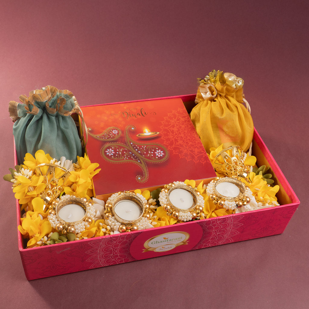Diwali gift hampers-Diwali Gifts-Pink Hamper tray of best bites, mithai pouches, dryfruit, toran and t-lights