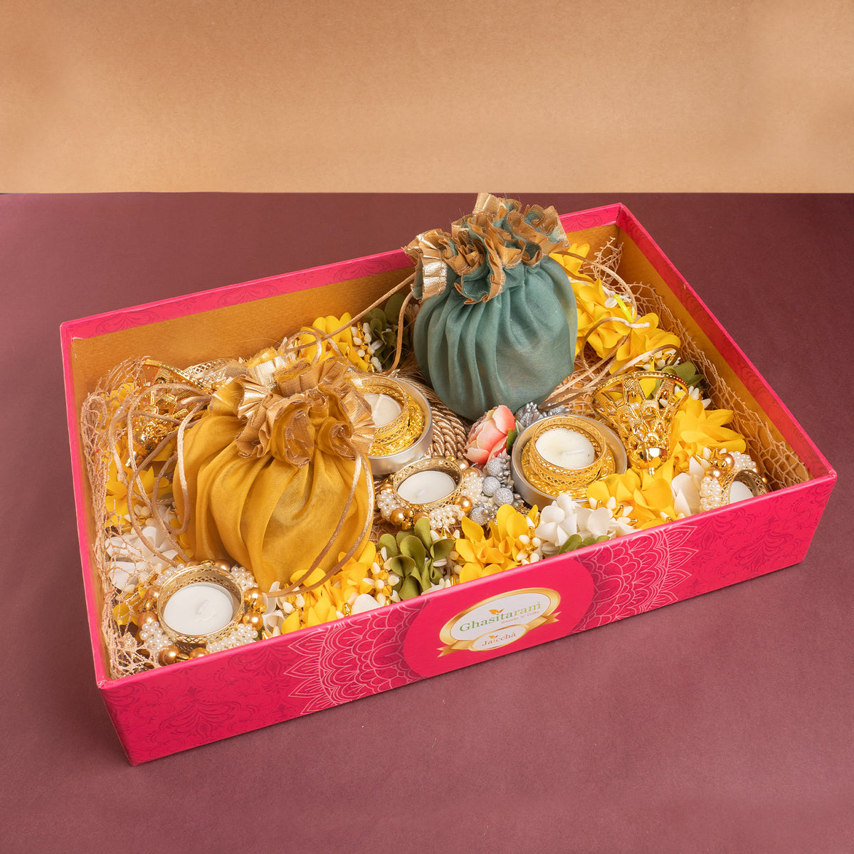 Diwali Gifts-Pink tray of mithai pouches, dryfruit, wishing card, t-lights and toran