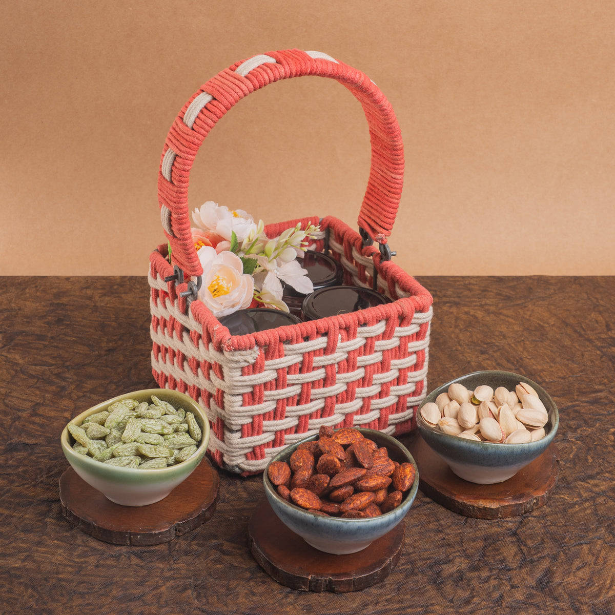 Diwali gifts-Pink Woven Basket with dryfruit Jars