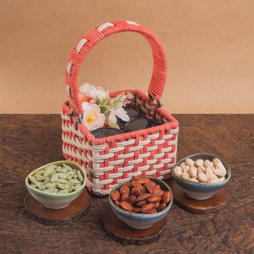 Diwali gifts-Pink Woven Basket with dryfruit Jars
