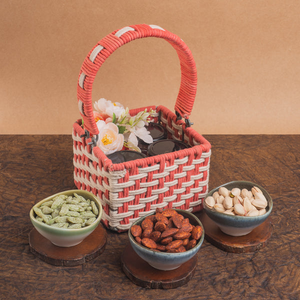 Diwali gifts-Pink Woven Basket with dryfruit Jars