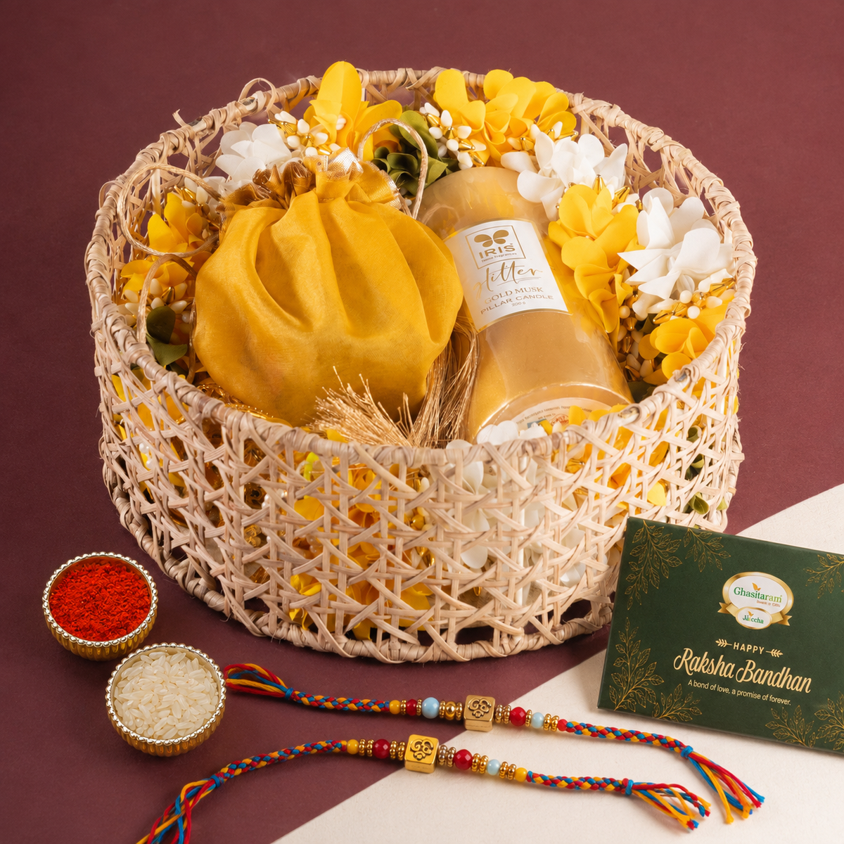 Round Rattan Basket with toran, dryfruits, and a Candle with 2 Rakhis