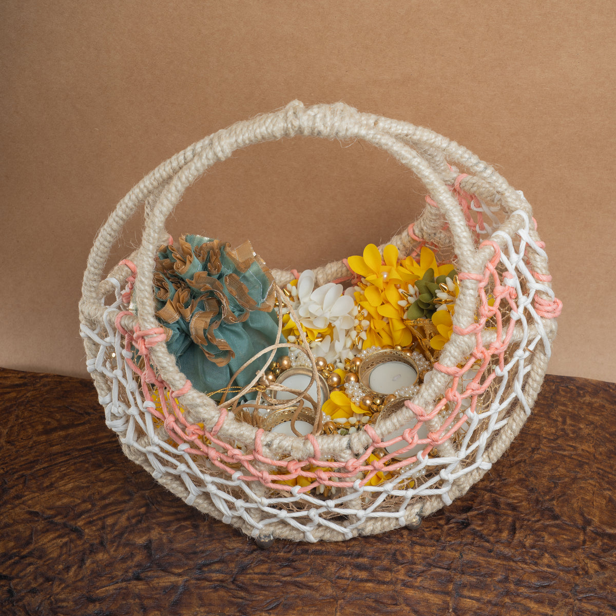 Diwali gift hampers-Diwali gifts-Ring basket with candle, toran and mithai pouches