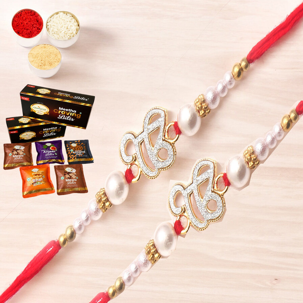 Set of 2 The Sparkle Of Wahegurujis Love For My Brother rakhi with Asorted bites box