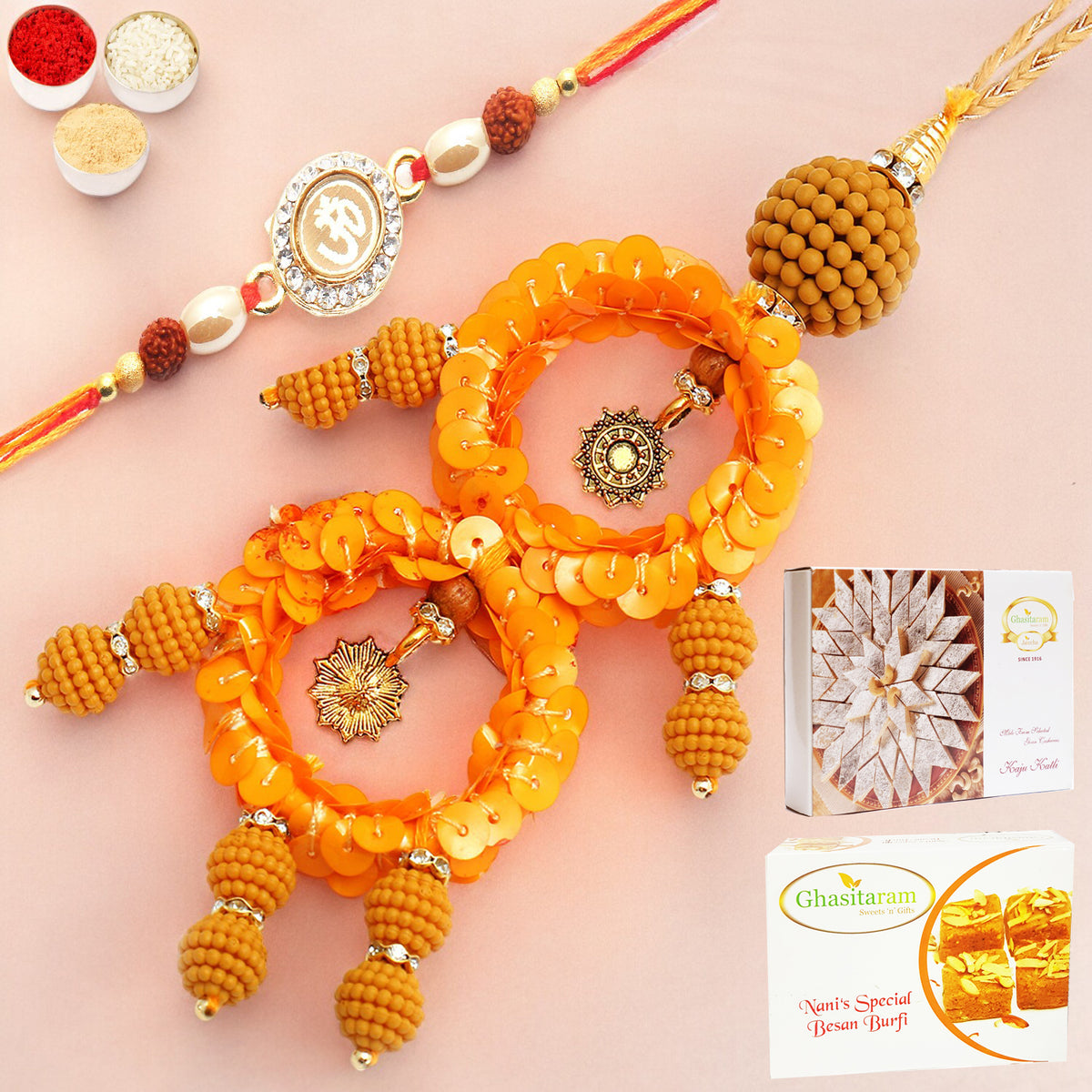 Rakhis Online- Sisters Blessings rm073 Bhaiya Bhabhi rakhi with 200 gms of Besan Barfi and 200 gms of Kaju Katli