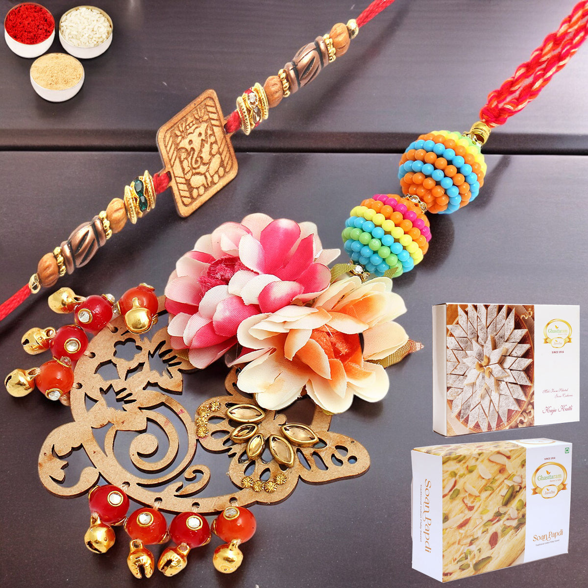 The Charasmatic rm079Bhaiya Bhabhi rakhi with 200 gms of Kaju katli and 200 gms of Soan Papdi