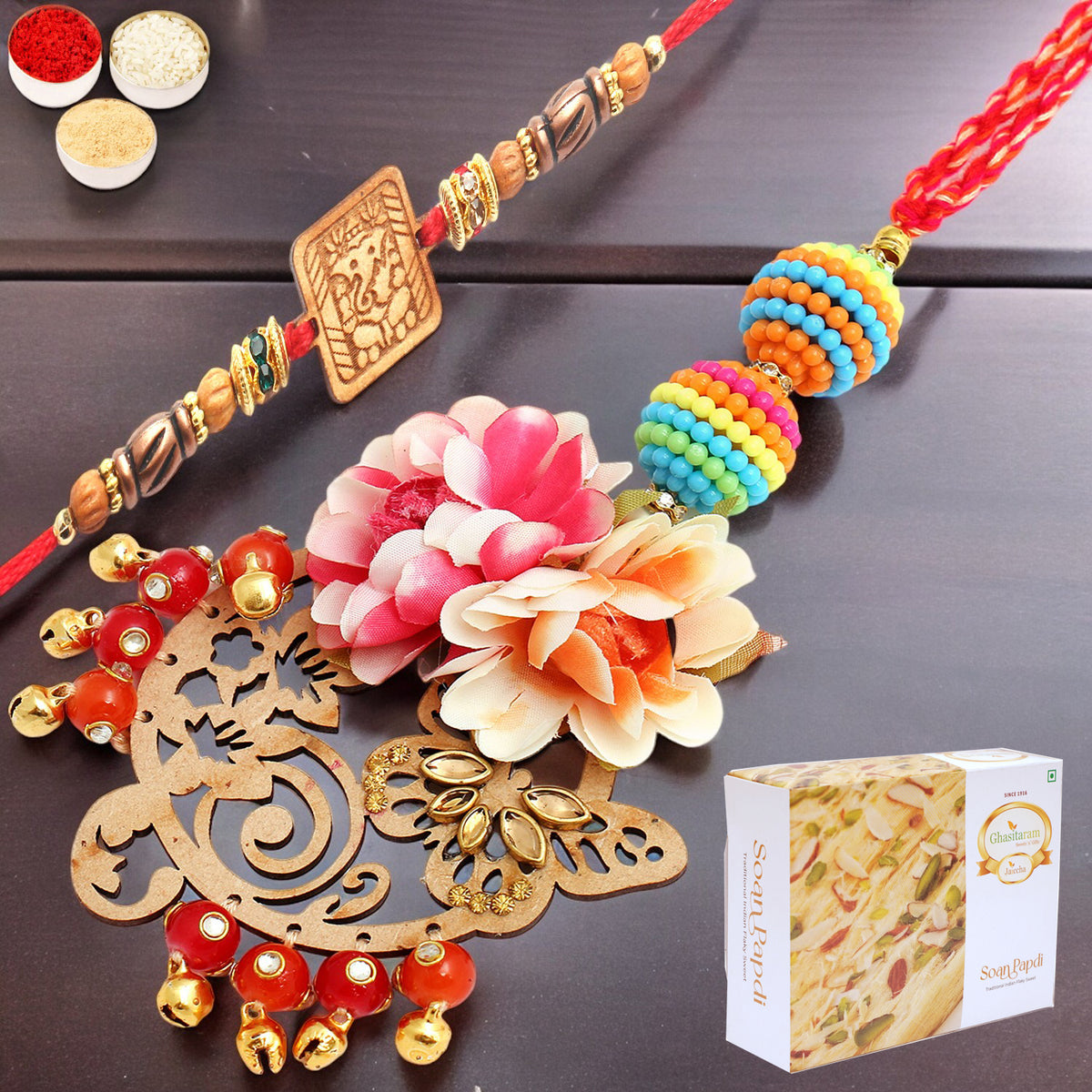 Rakhis Online USA-  The Charasmatic rm079Bhaiya Bhabhi rakhi with 200 gms Soan Papdi