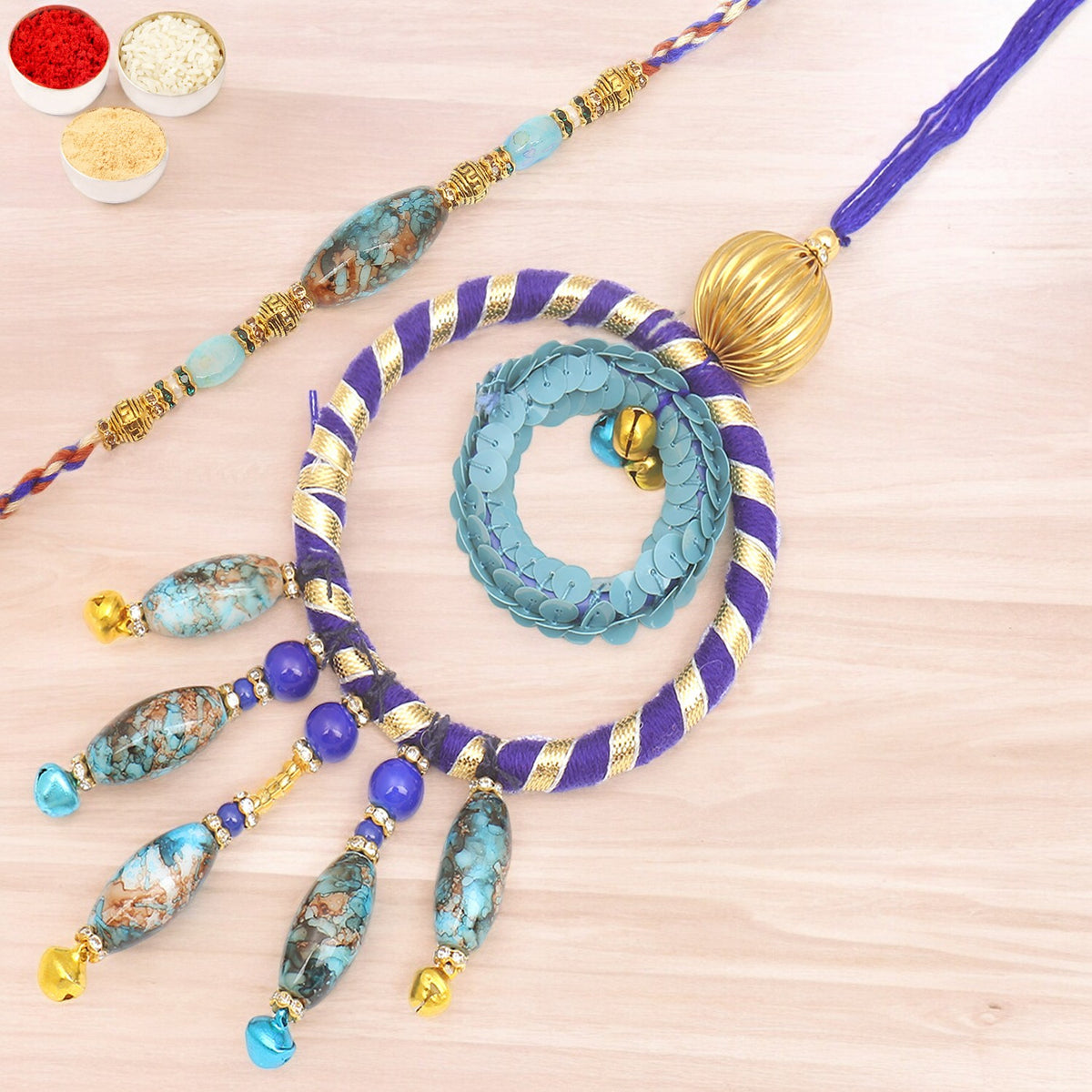 Rakhis Online- The Ever Lasting Bond rm100 Bhaiya Bhabhi Rakhi with 100 gms of Dryfruits Mix Can 200 gms of Kaju katli