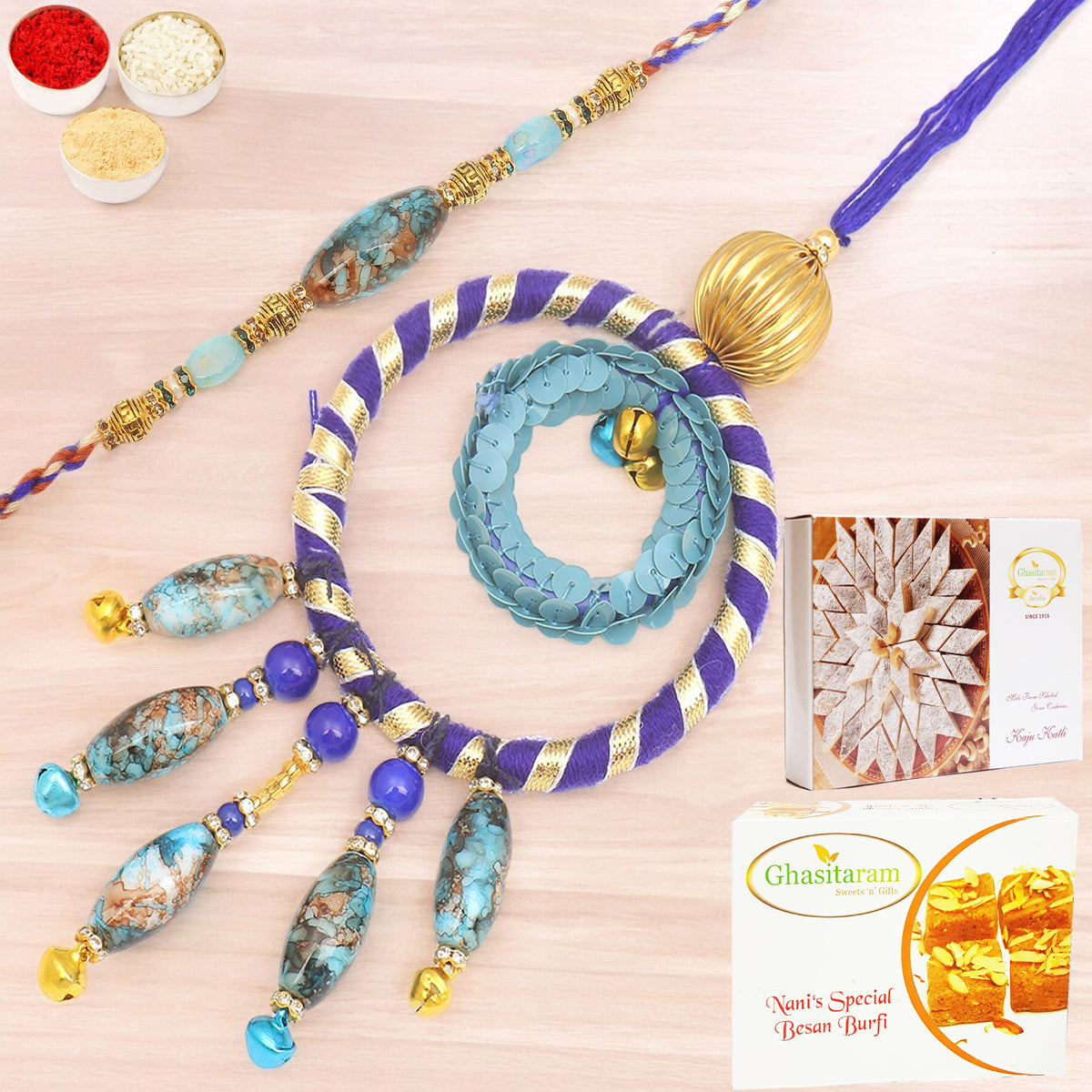 Rakhis Online- The Ever Lasting Bond rm100 Bhaiya Bhabhi Rakhi with 200 gms of Besan Barfi and 200 gms of Kaju Katli