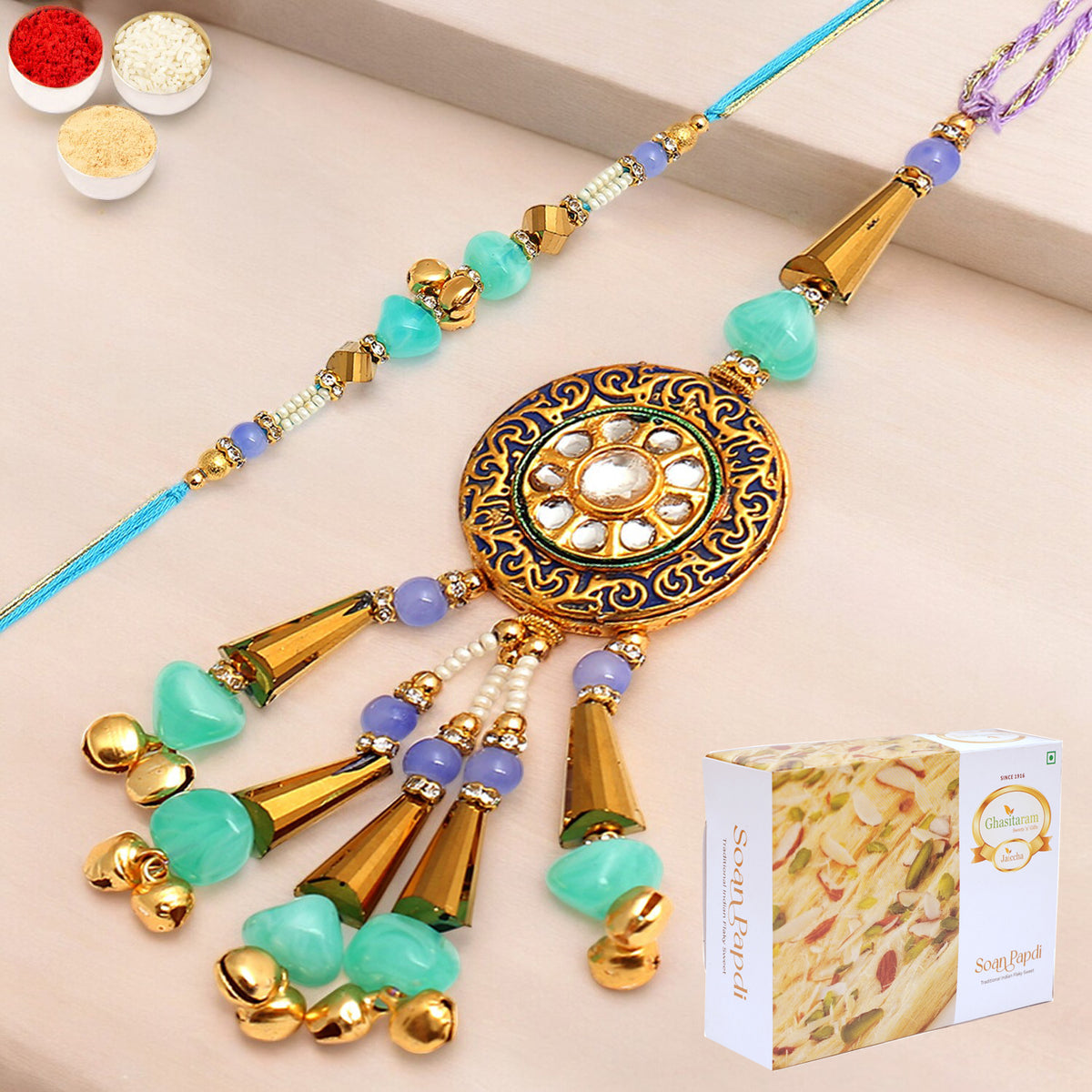 Rakhis Online Australia-  The Last Mundra rm106 Bhaiya Bhabhi Rakhi with 200 gms Soan Papdi