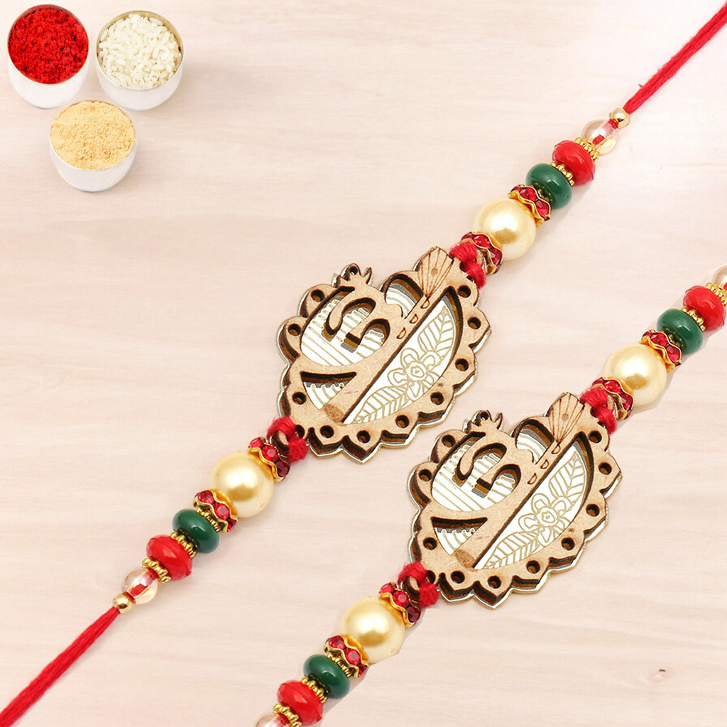 Rakhis Online Australia- Set of 2 The Beam Of Om g7834 rakhi