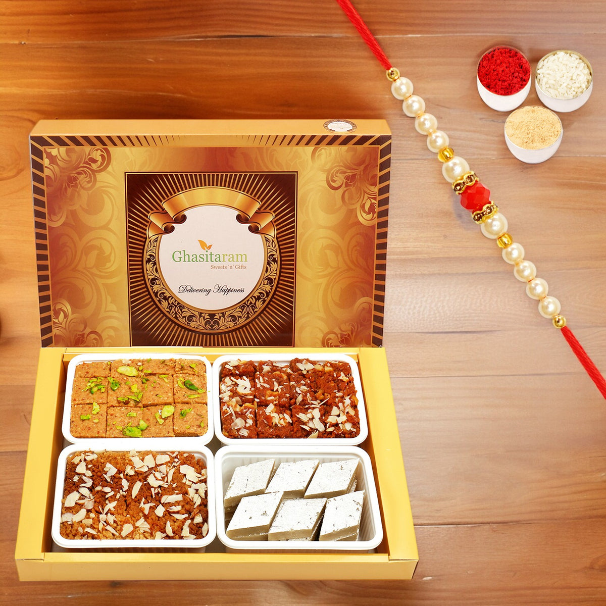 Big Box of Kaju Katli, Mysore Pak, Dodha Barfi and Milk Cake with Pearl Beads Rakhi
