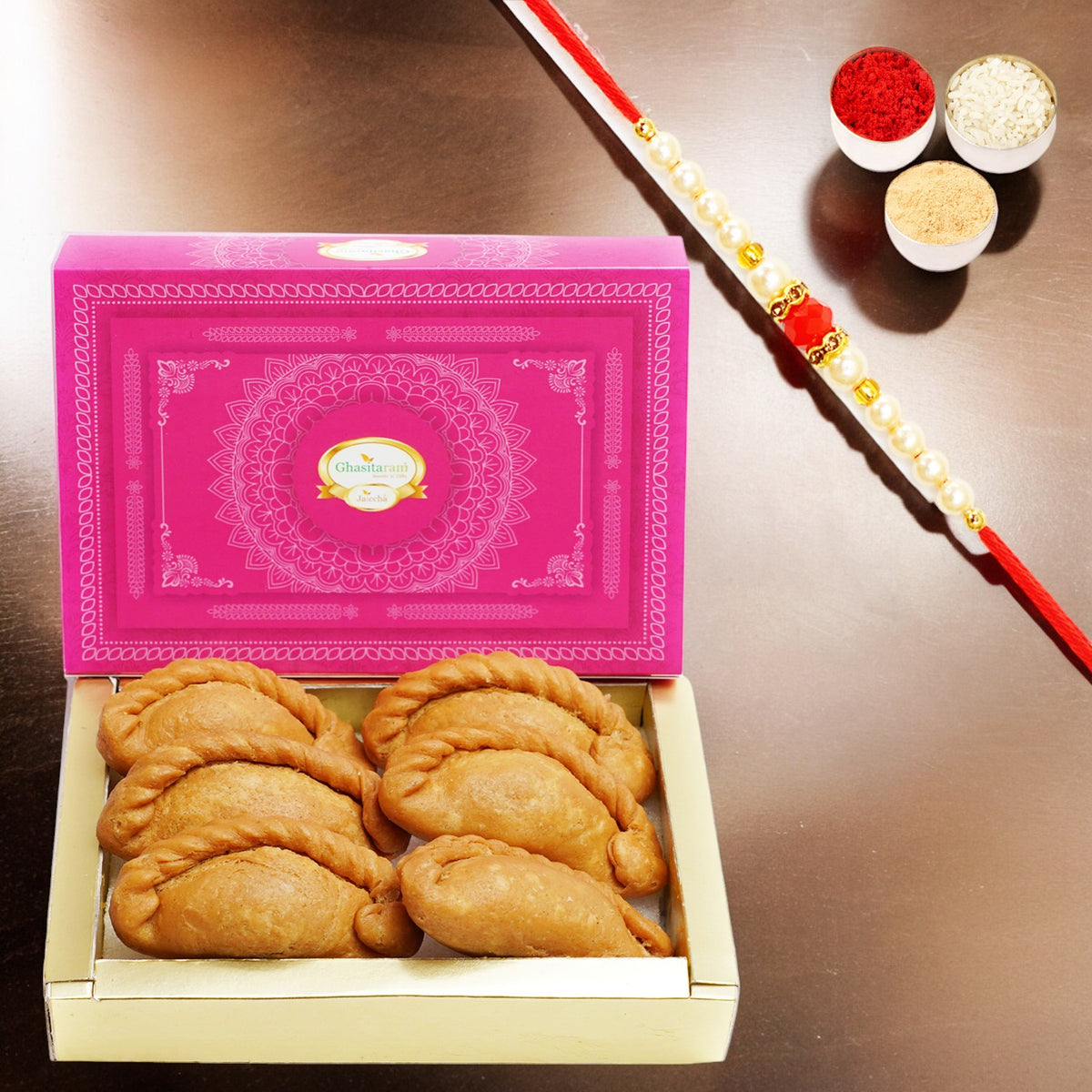 Ghasitaram's Sweets Healthy Wheat Gujiya 200 gms with Pearl Beads Rakhi