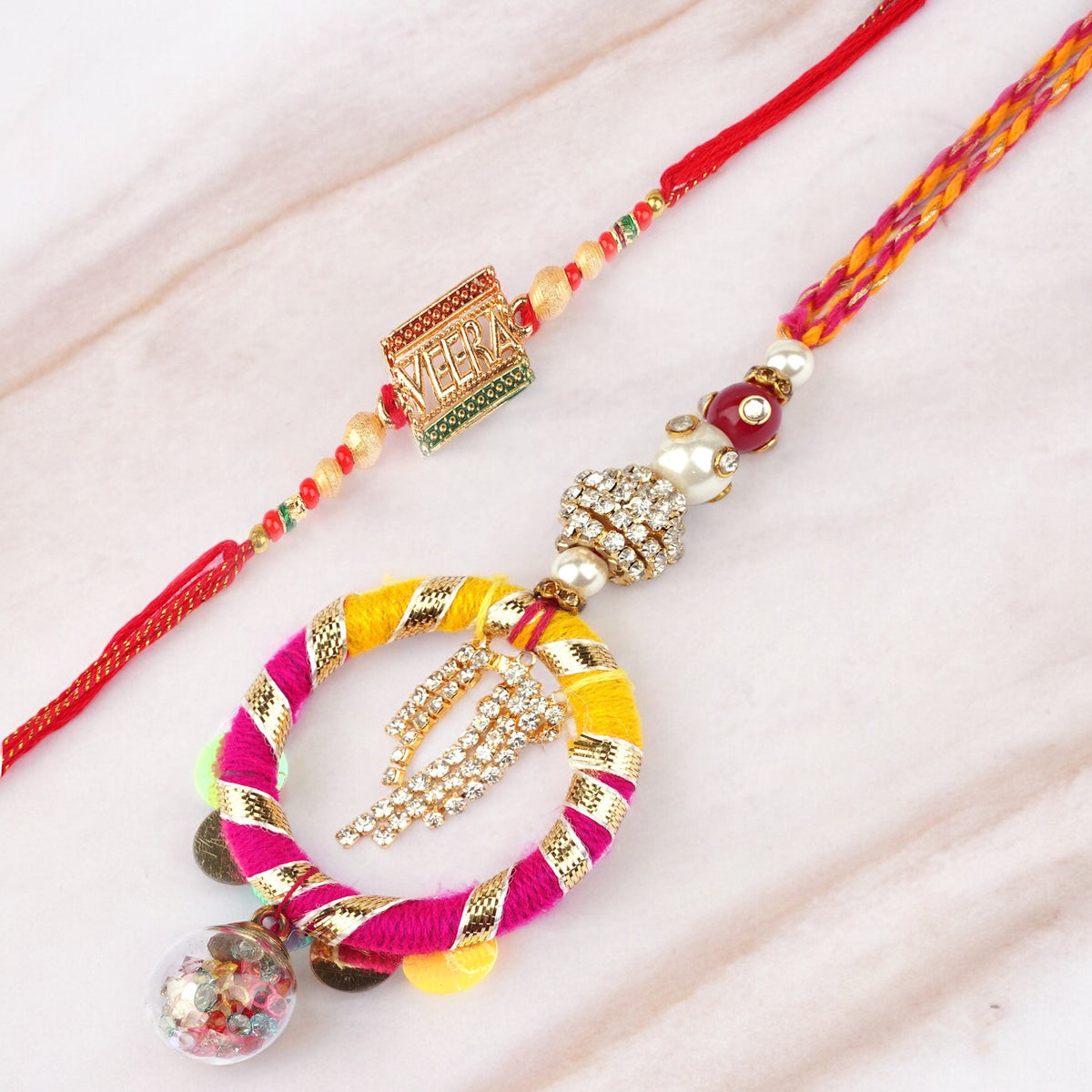 Rakhis Online- RM-130 Bhaiya Bhabhi rakhi with 100 gms of Dryfruits Mix Can 200 gms of Kaju katli