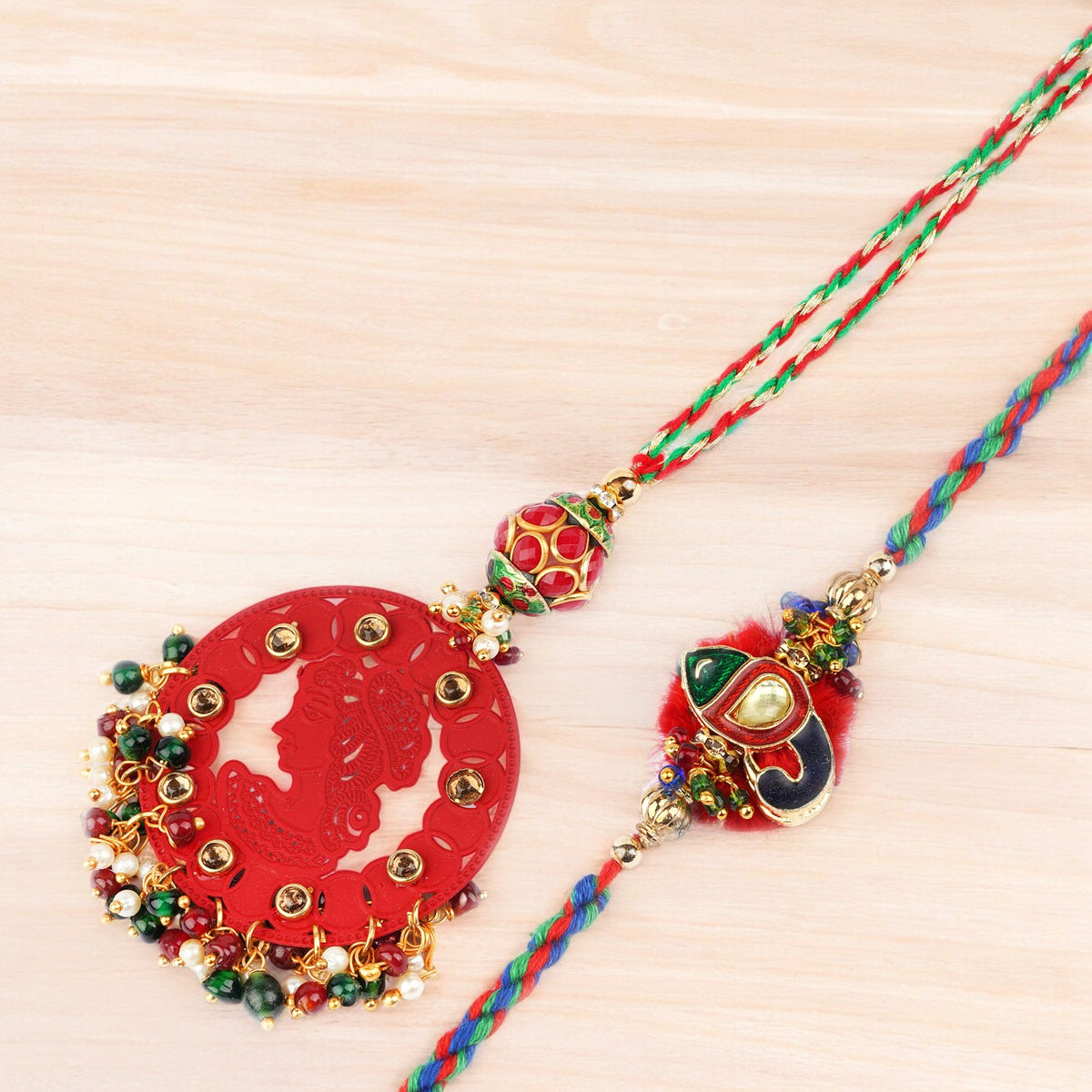 Rakhis Online- RM-140 Bhaiya Bhabhi rakhi with 100 gms of Dryfruits Mix Can 200 gms of Kaju katli