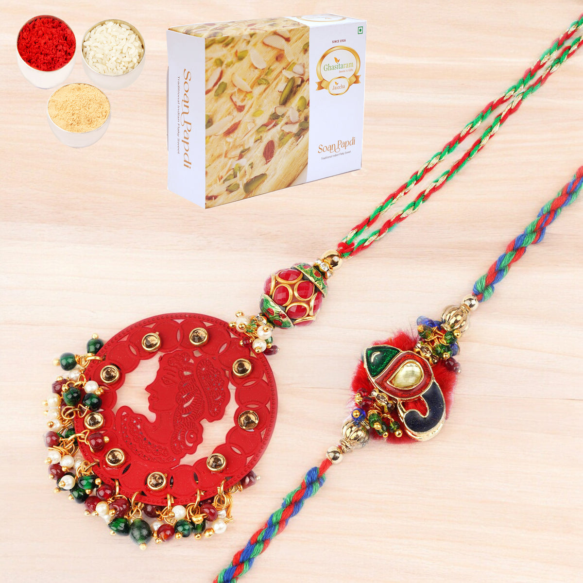 Rakhis Online- RM-140 Bhaiya Bhabhi rakhi with 400 gms of Soan Papdi